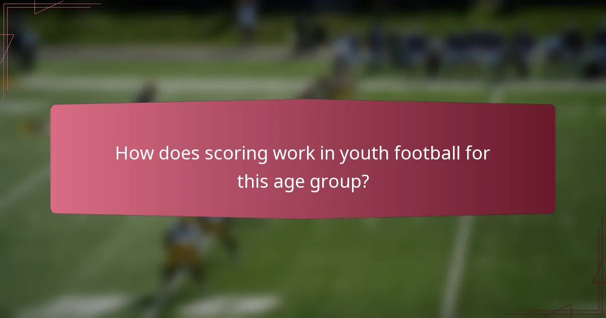 How does scoring work in youth football for this age group?