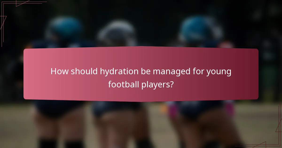 How should hydration be managed for young football players?